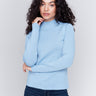 Long-sleeve reversible mock neck sweater in light and dark blue by Charlie B.