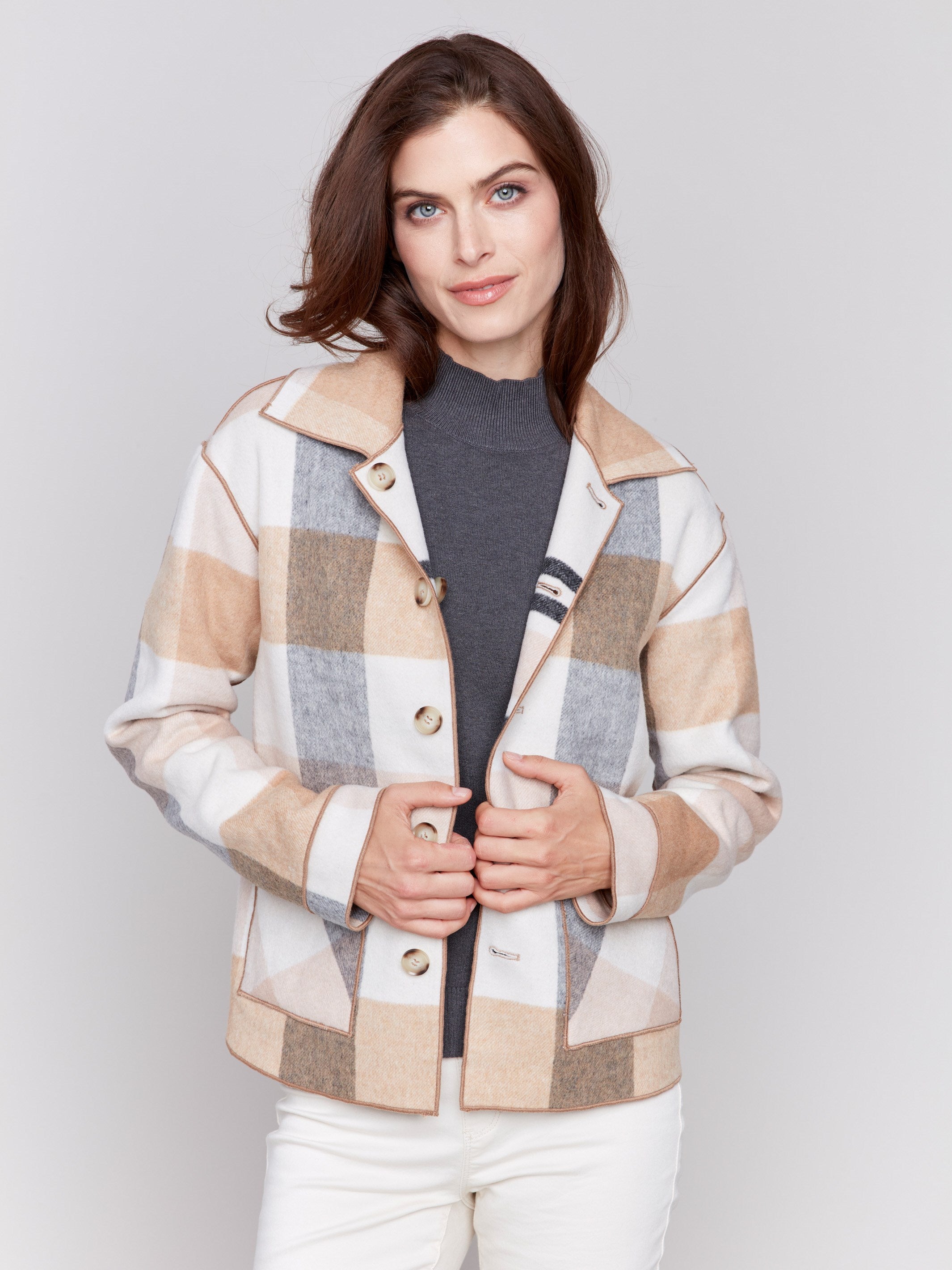 Reversible plaid jacket in quartz pink with button front and patch pockets by Charlie B. Demonstrated in a plaid pattern on each side, in shades of Quartz.