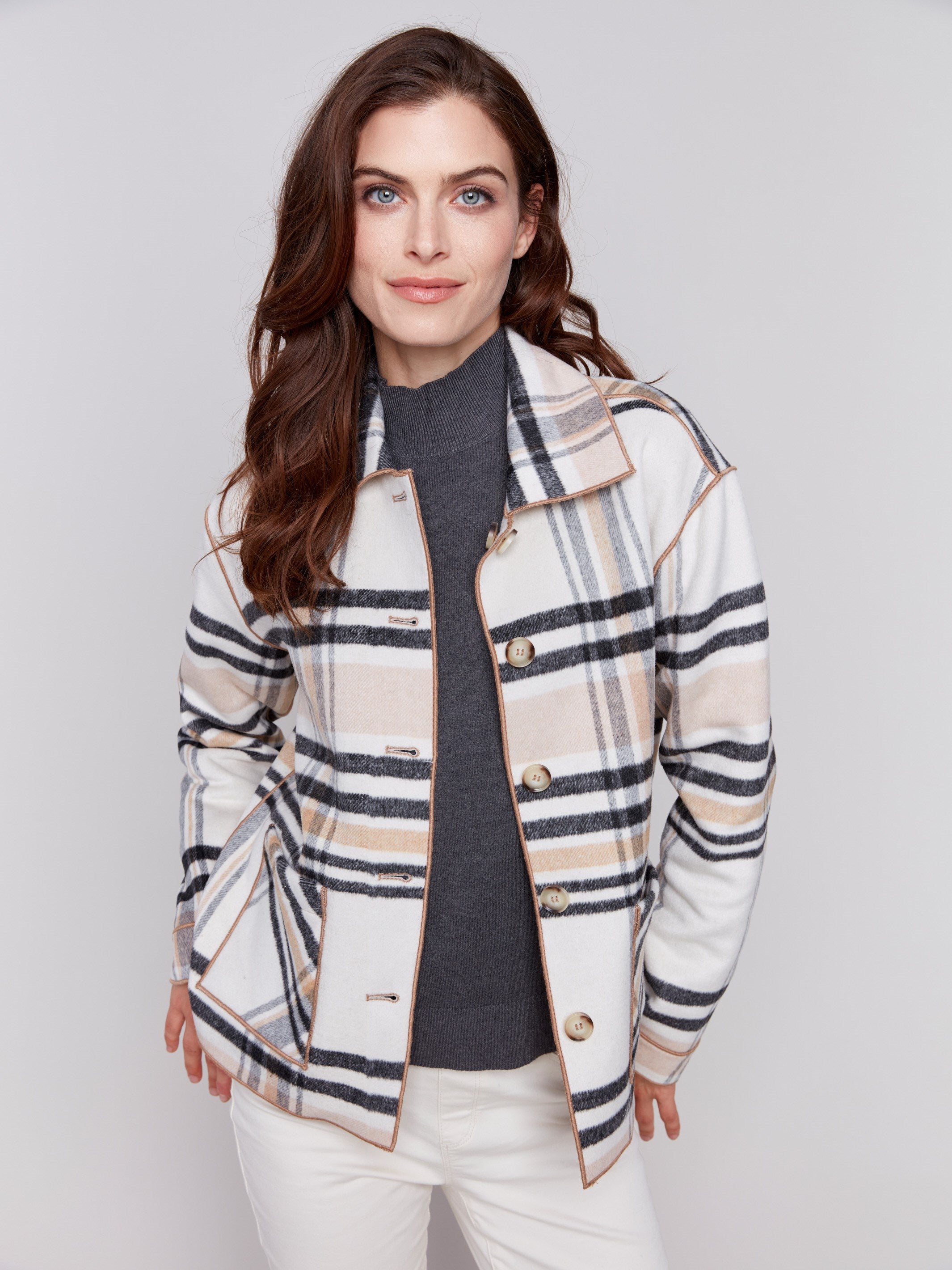 Reversible plaid jacket in quartz pink with button front and patch pockets by Charlie B. Demonstrated in a plaid pattern on each side, in shades of Quartz.