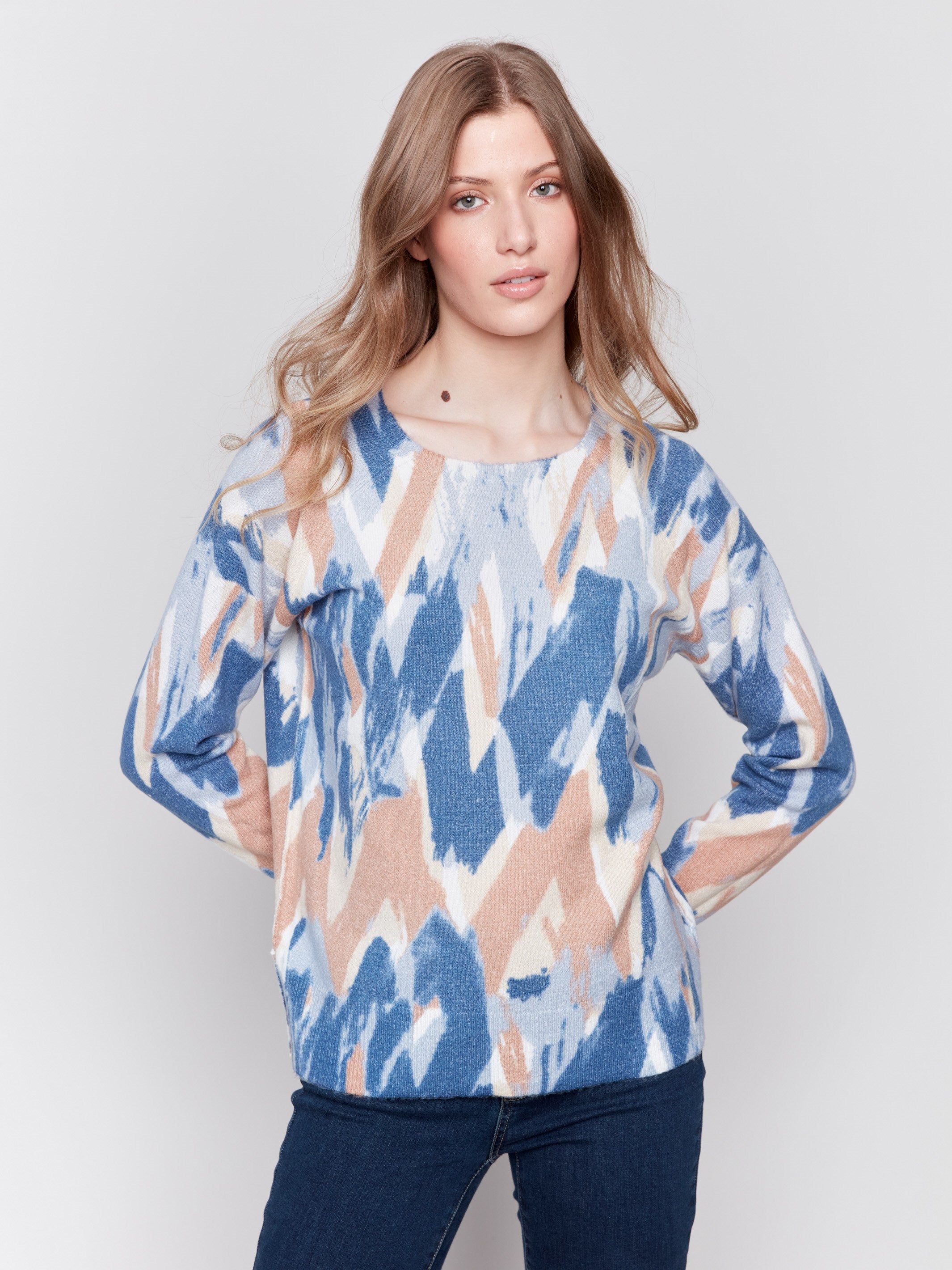 Truffle and blue reversible sweater with an abstract pattern, featuring raglan sleeves and a crew neckline by Charlie B.