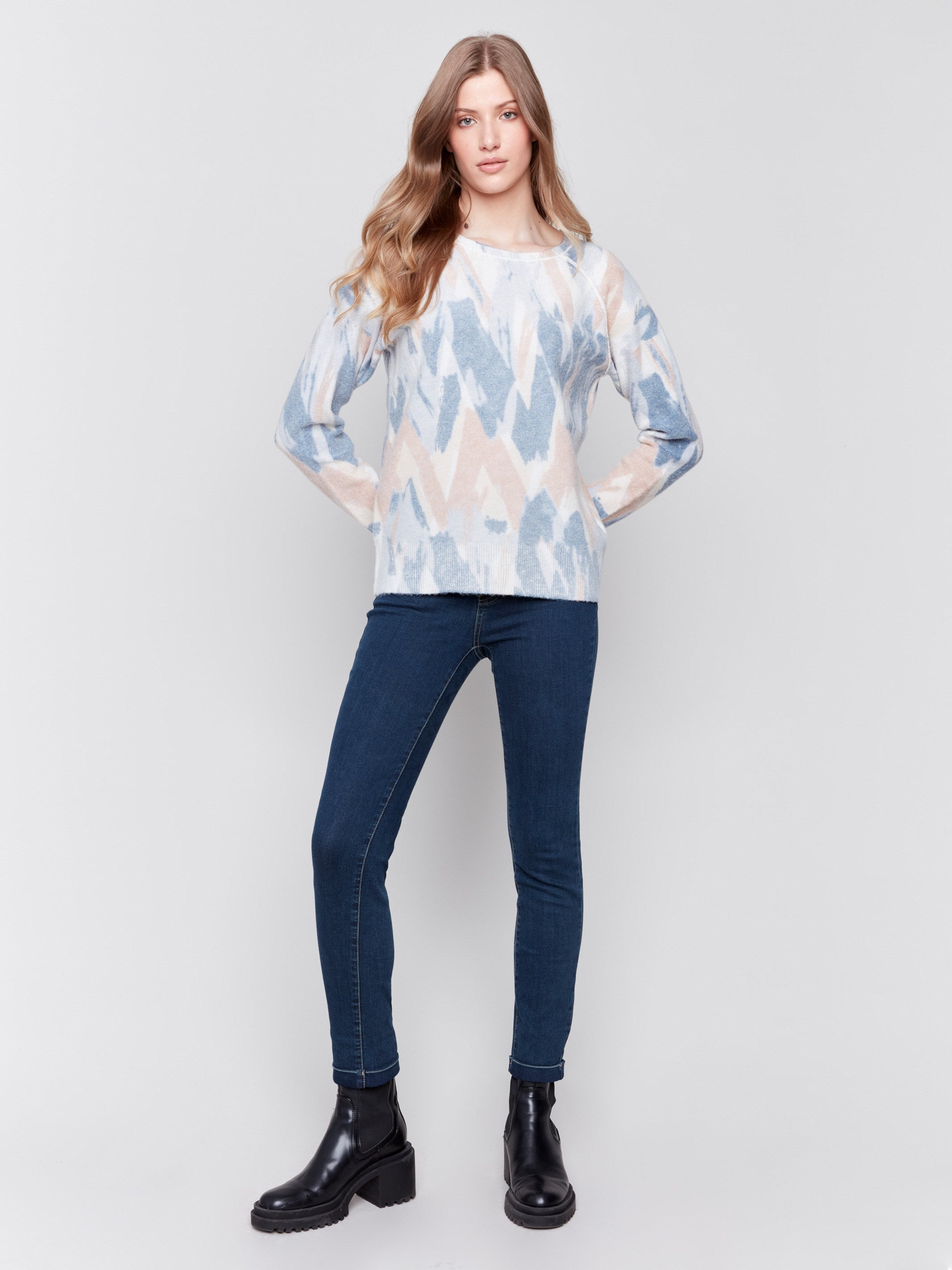 Truffle and blue reversible sweater with an abstract pattern, featuring raglan sleeves and a crew neckline by Charlie B.