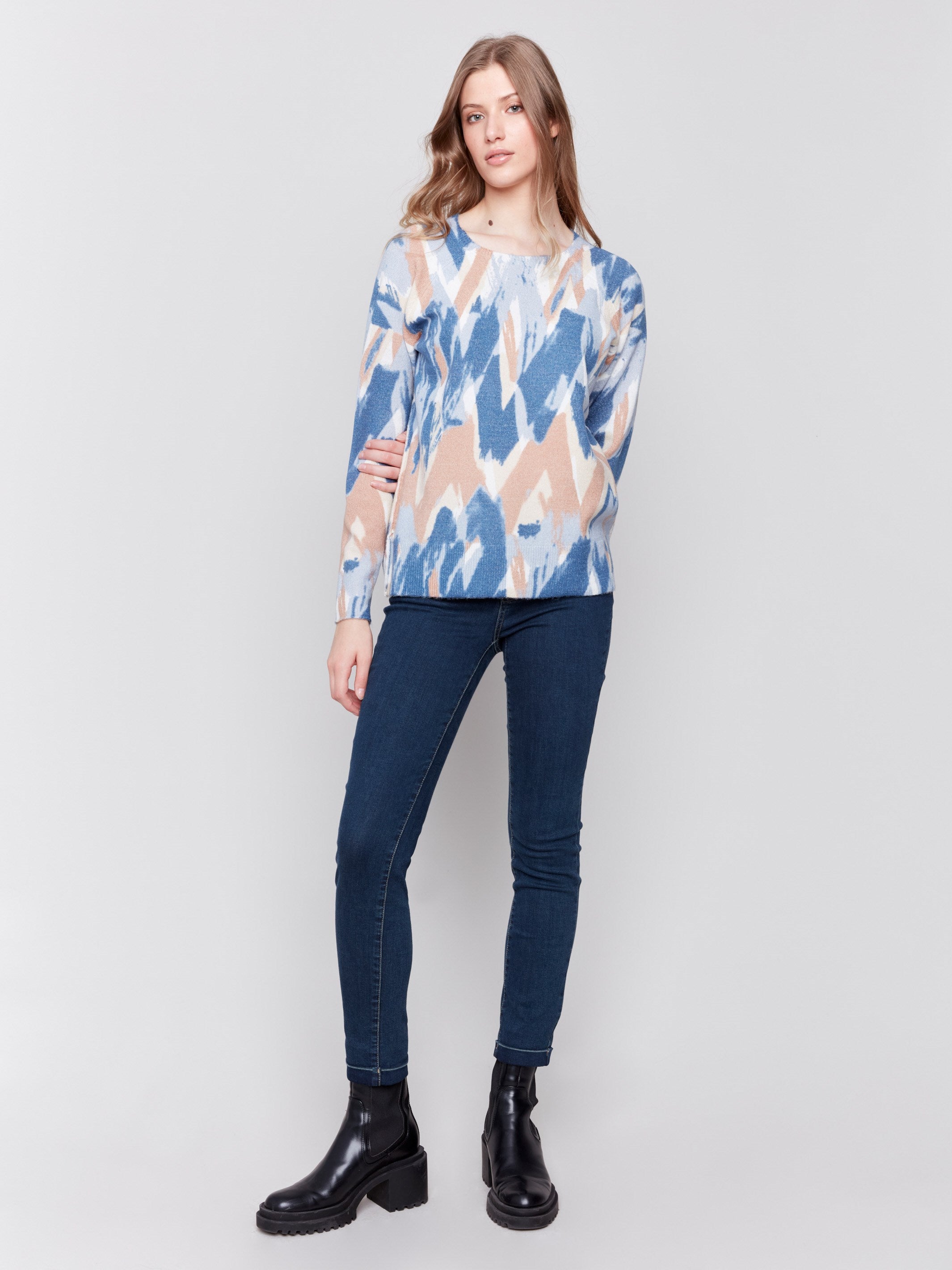 Truffle and blue reversible sweater with an abstract pattern, featuring raglan sleeves and a crew neckline by Charlie B.