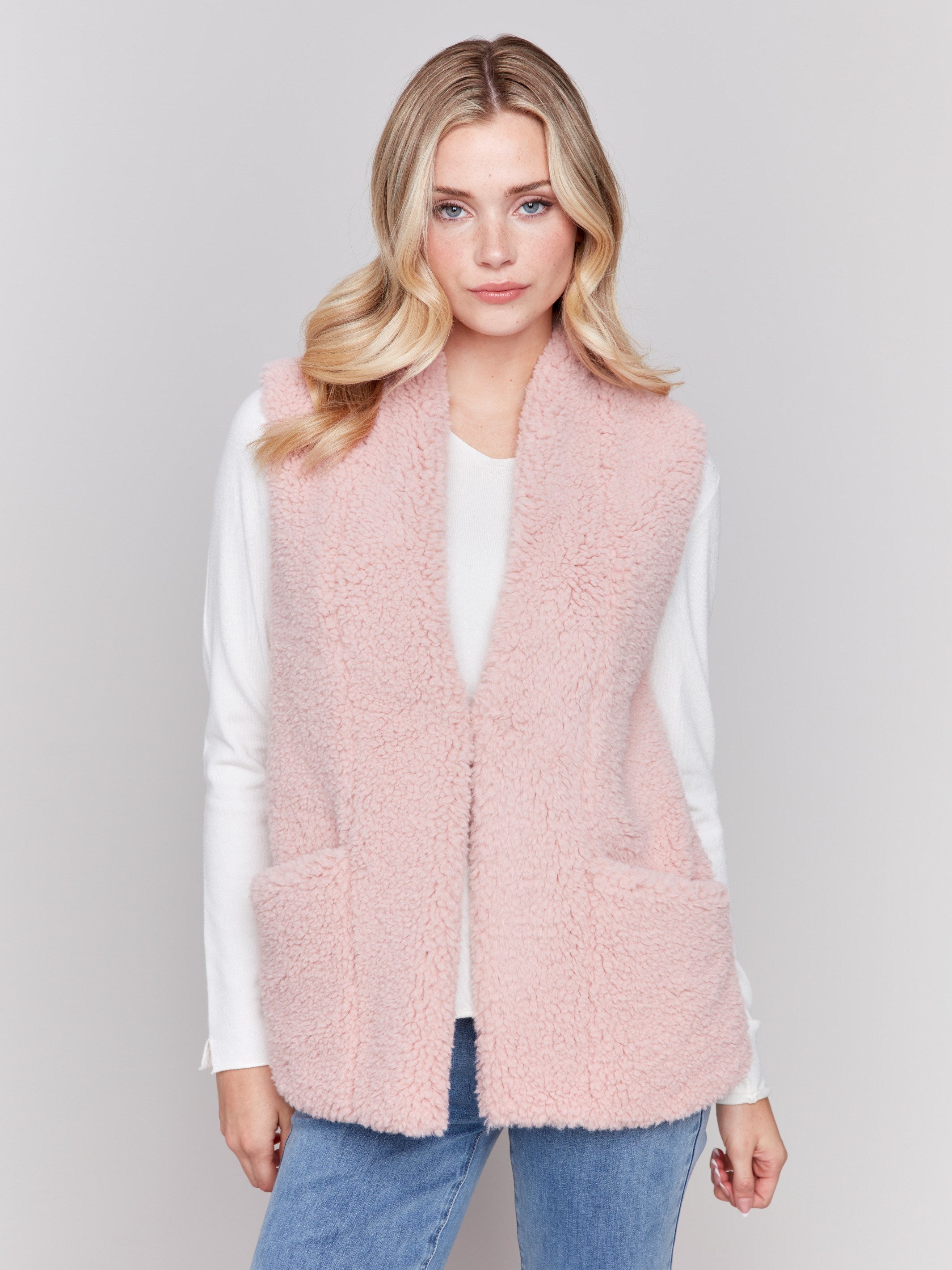 Short quartz pink faux fur vest with open front by Charlie B.