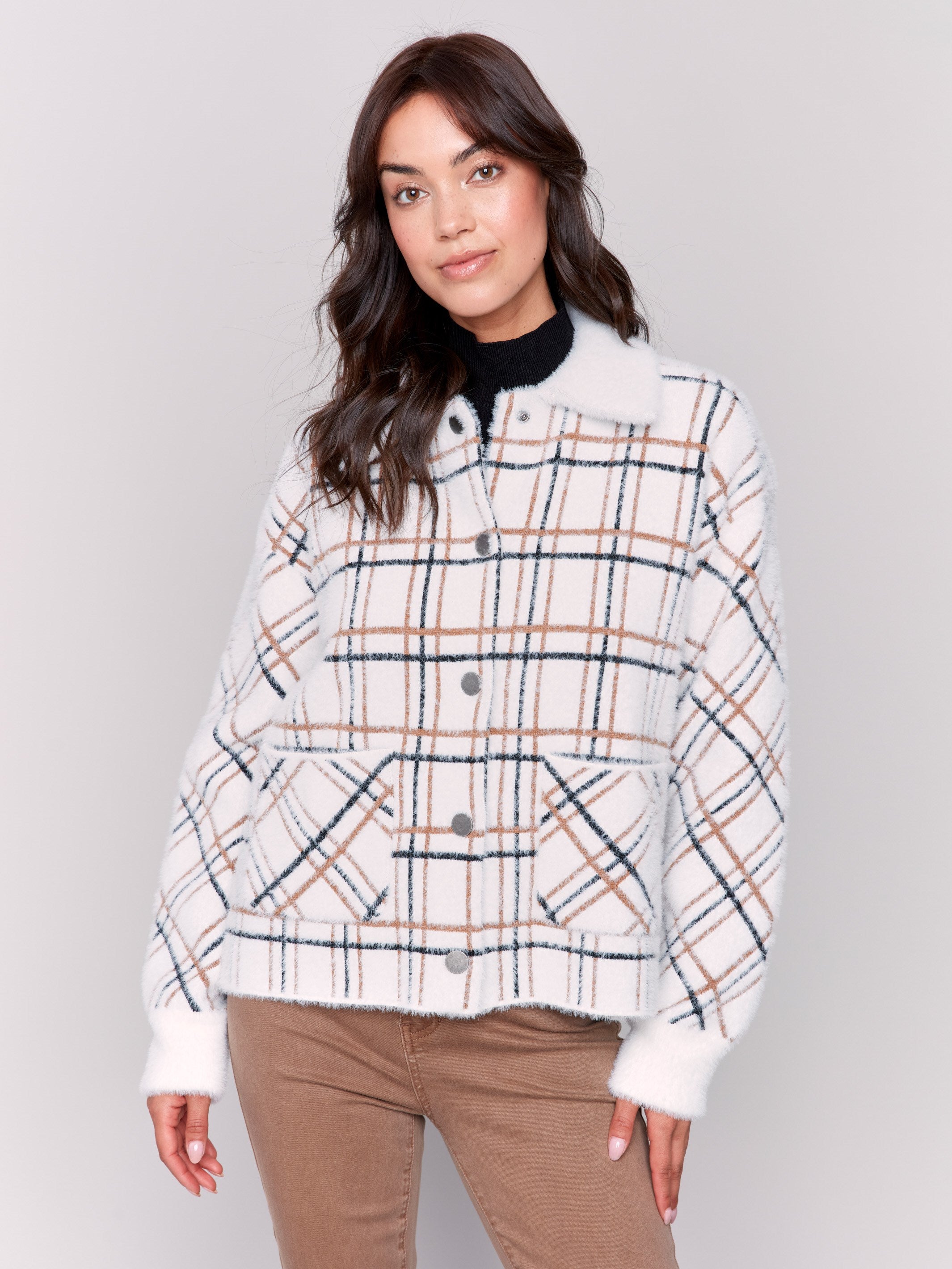 Short plaid knit jacket with a classic design in terracotta tones, featuring patch pockets and full button closure by Charlie B.