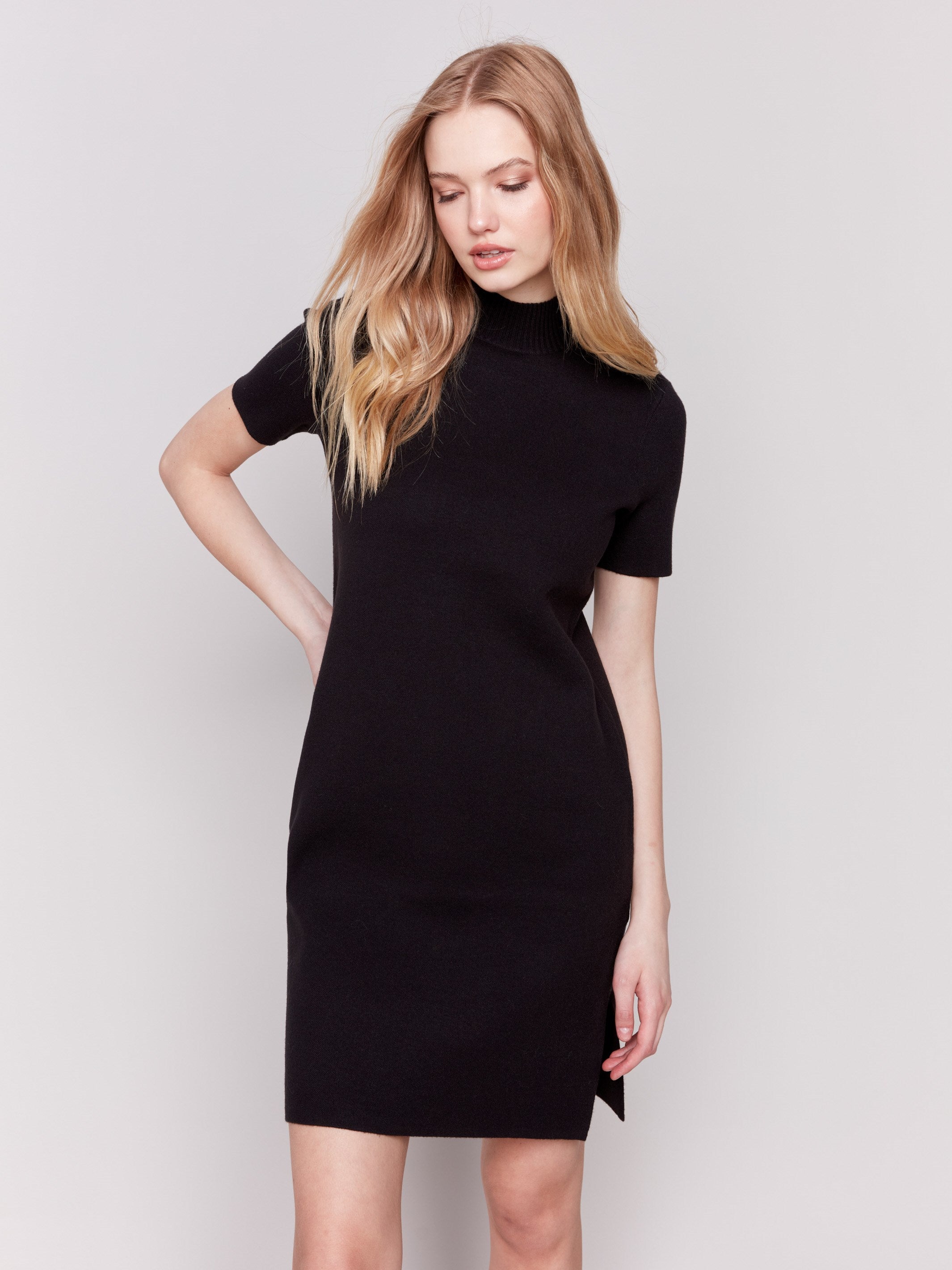 Black short-sleeve mock neck sweater dress with side slits by Charlie B.