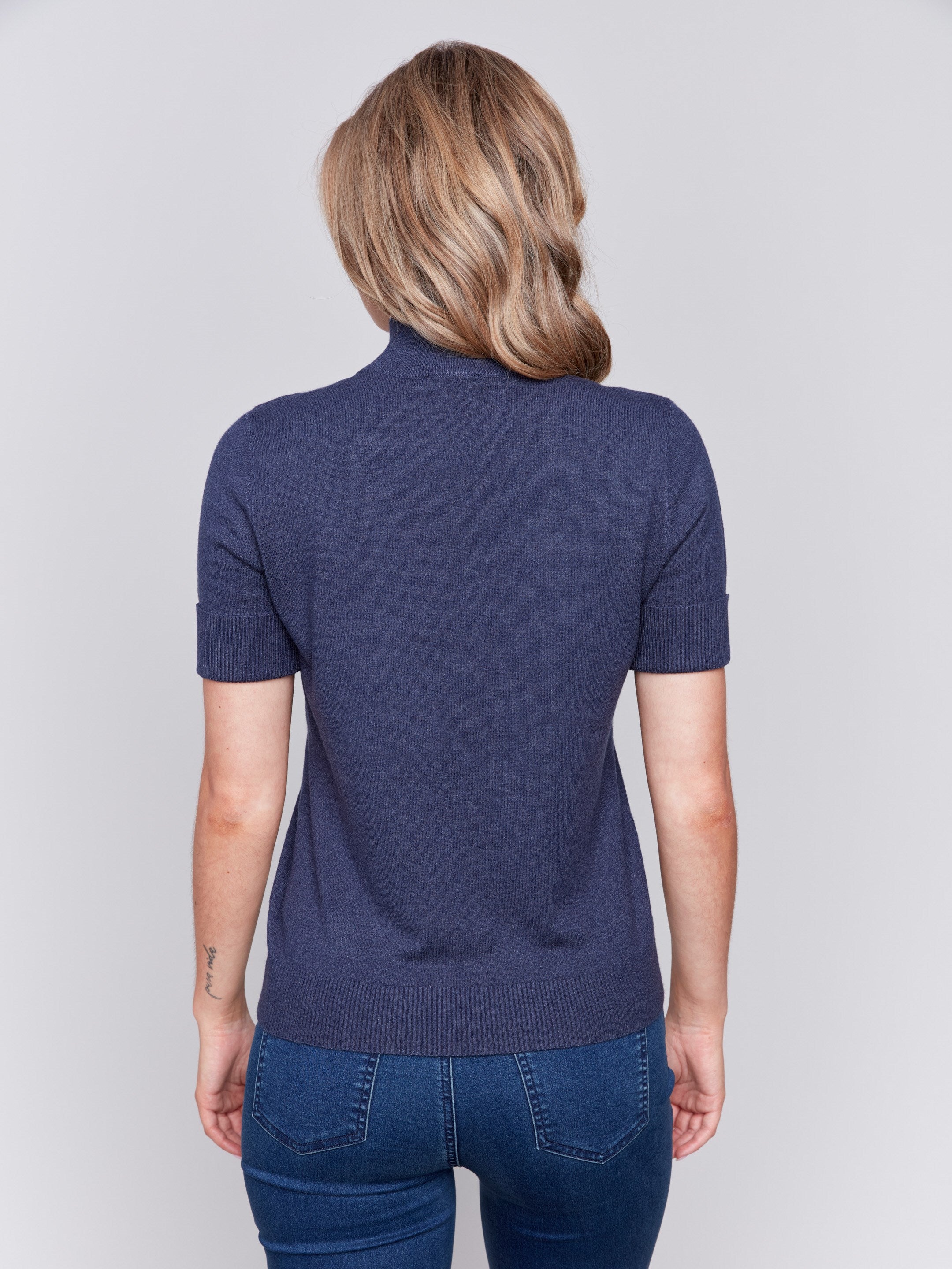 Heather denim short sleeve mock neck sweater with ribbed cuffs and hem by Charlie B.