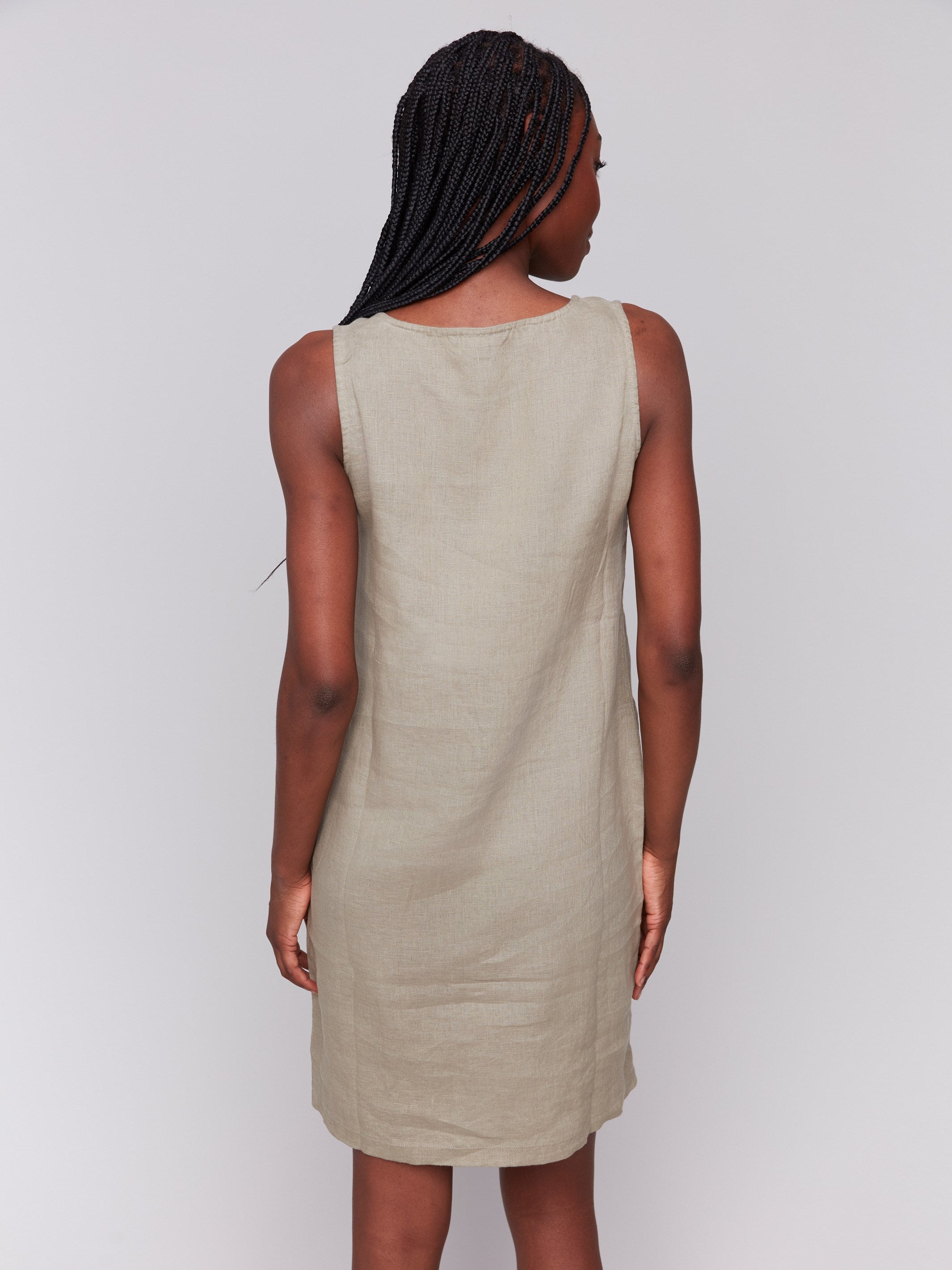 Elegant front slit on a celadon linen blend dress by Charlie B.