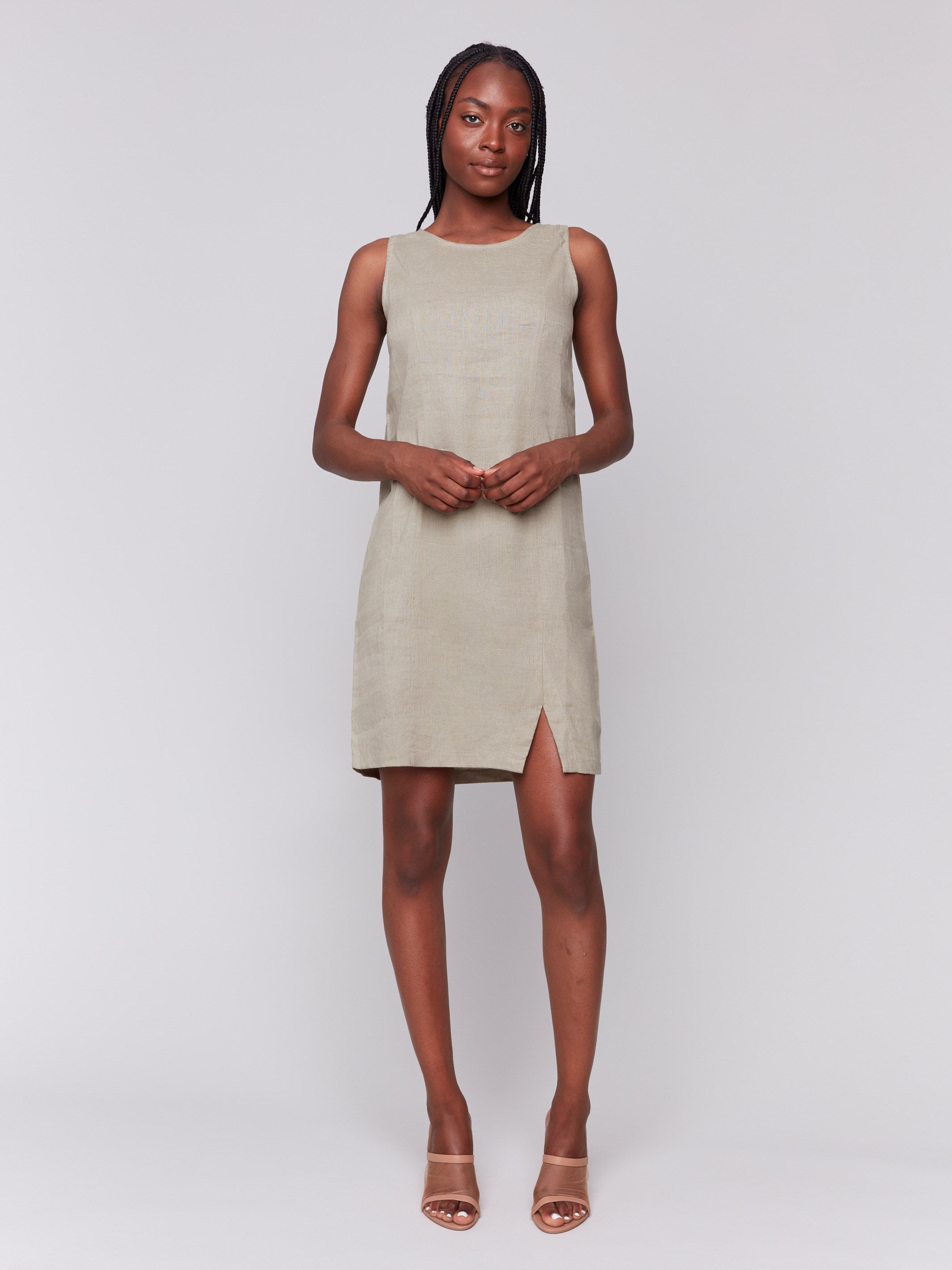 Stylish sleeveless design in celadon linen blend attire by Charlie B.