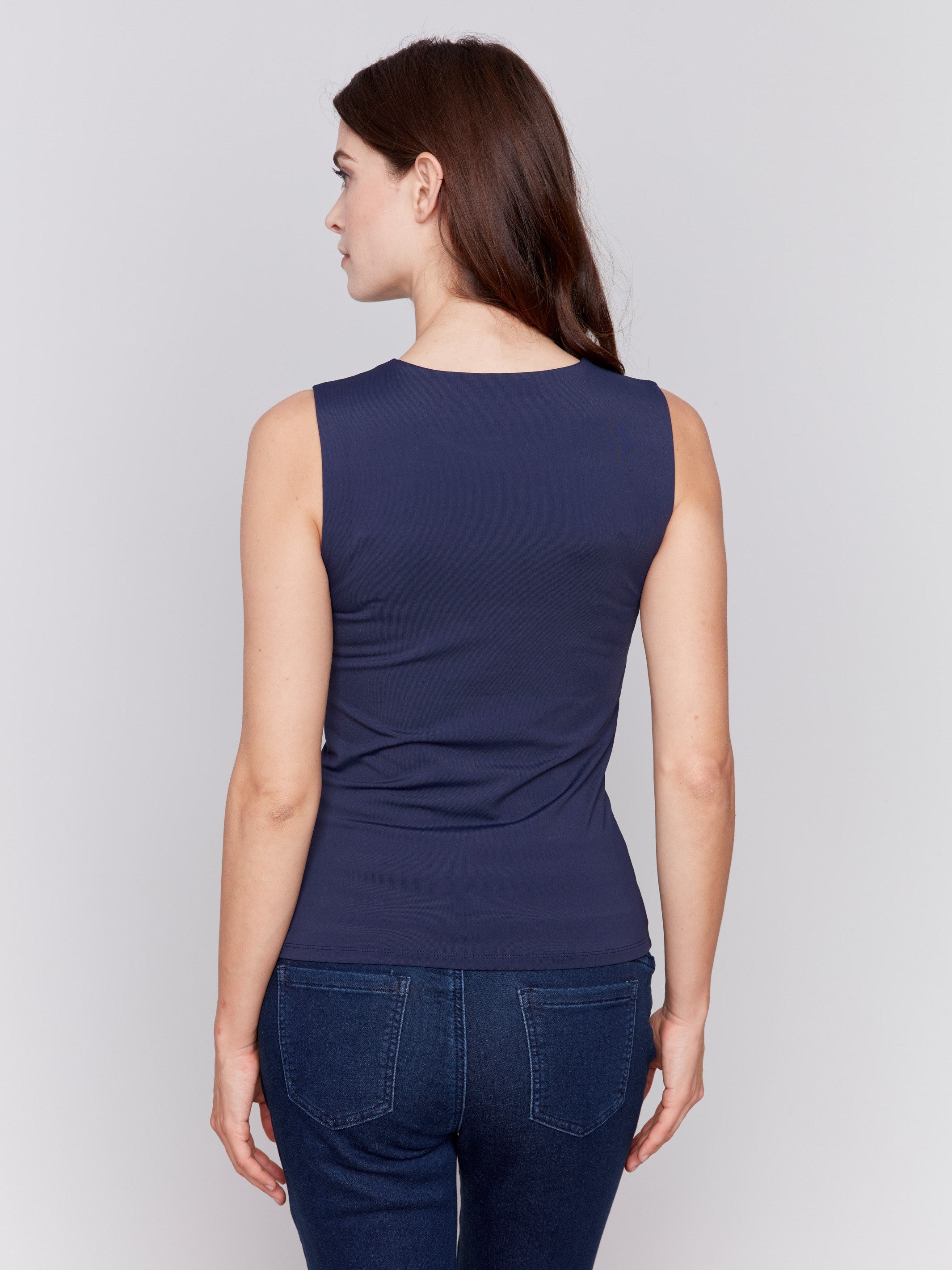 Navy blue sleeveless super stretch top with a crew neckline by Charlie B.