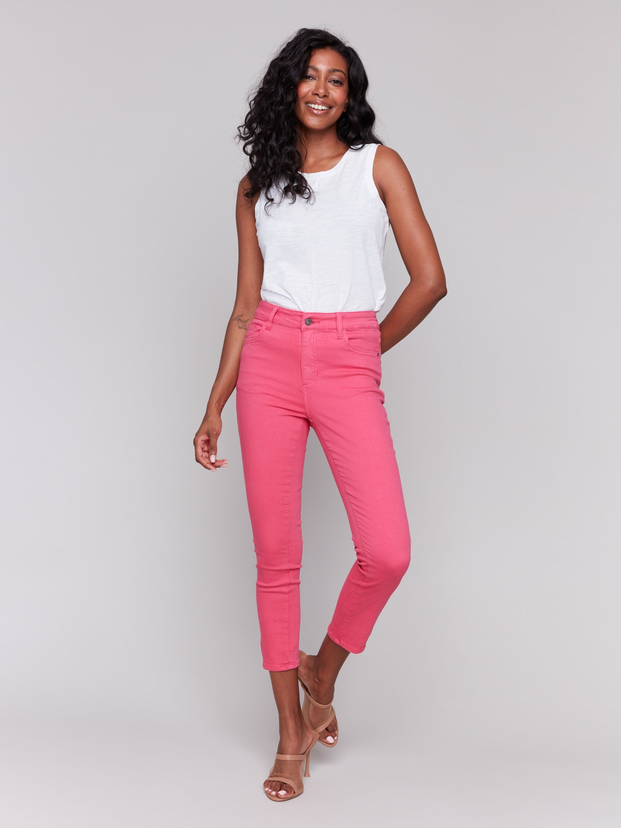 Pink slim fit cropped pants with side mini tabs by Charlie B.