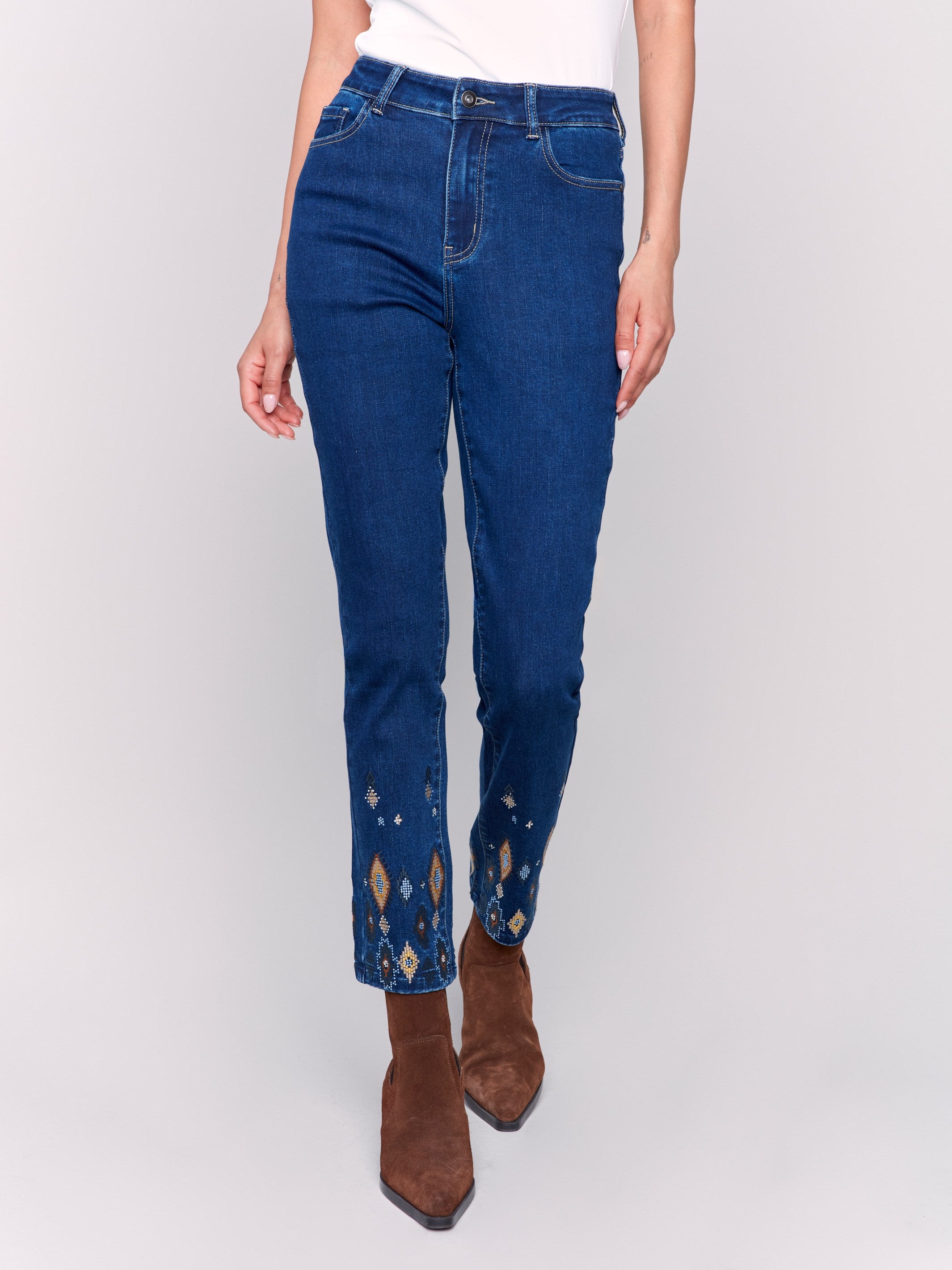 Indigo slim fit jeans with a beaded hem design, featuring a five-pocket style and regular rise by Charlie B.