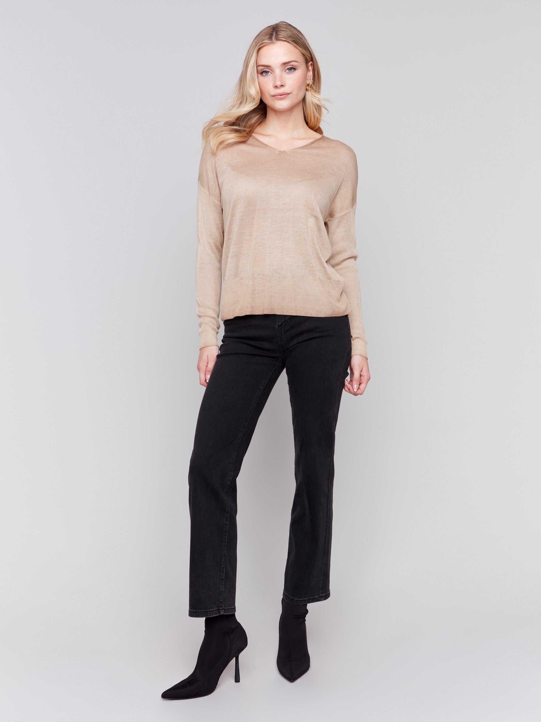 Truffle brown V-neck sweater with long sleeves, showcasing a relaxed fit and snow wash texture by Charlie B.