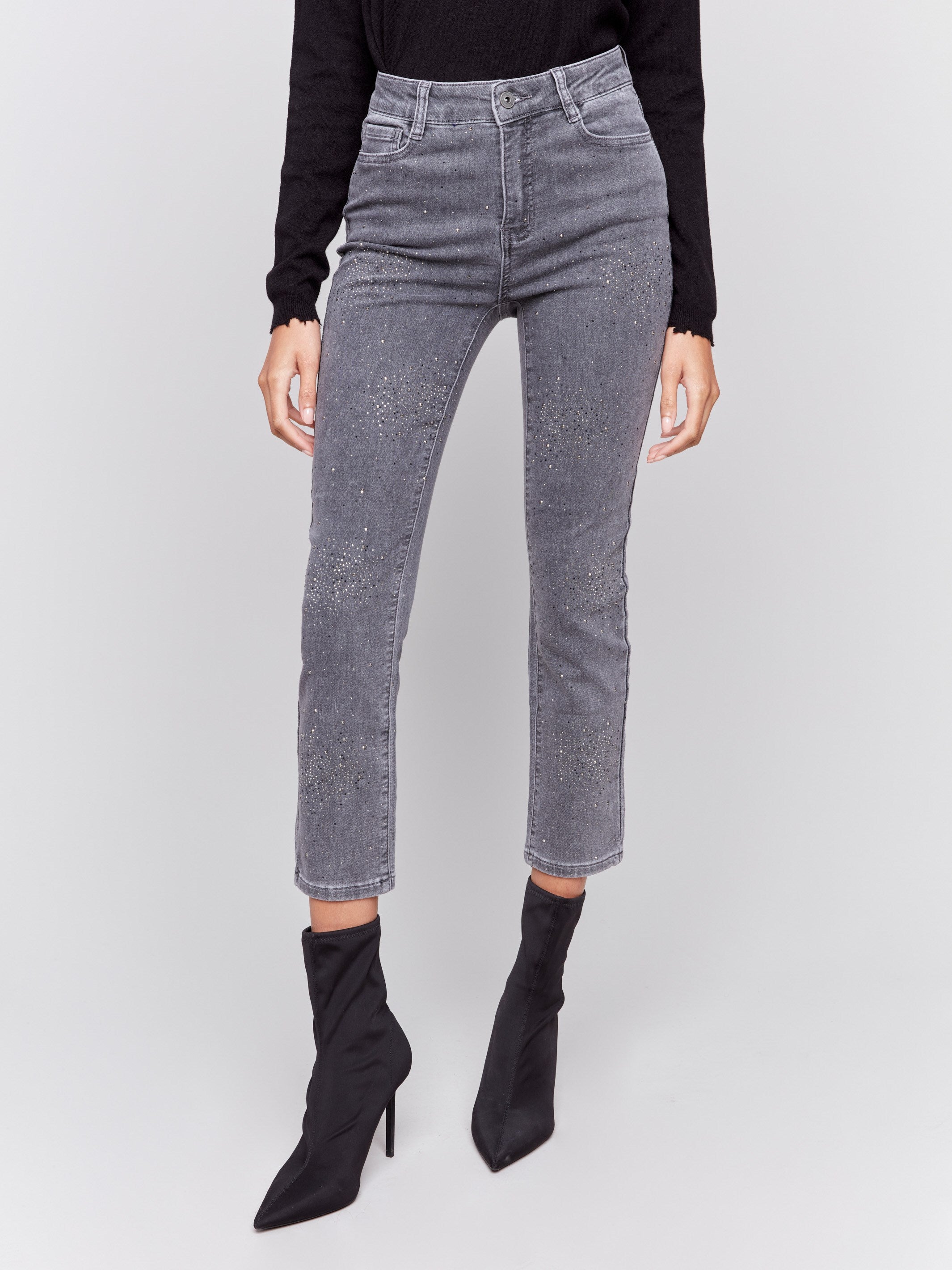 Medium grey slim-leg denim pants with all-over studs by Charlie B.