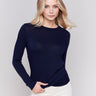 Navy blue long-sleeve jersey top featuring a crew neckline and a unique front knot detail by Charlie B.