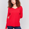 Cranberry red V-neck sweater with long sleeves featuring side slits, made from plushy yarn by Charlie B.