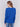 Sapphire blue V-neck sweater with long sleeves featuring side slits, made from plushy yarn by Charlie B.