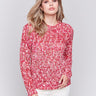 Magenta pink sweater with a space dye pattern and crew neckline by Charlie B.