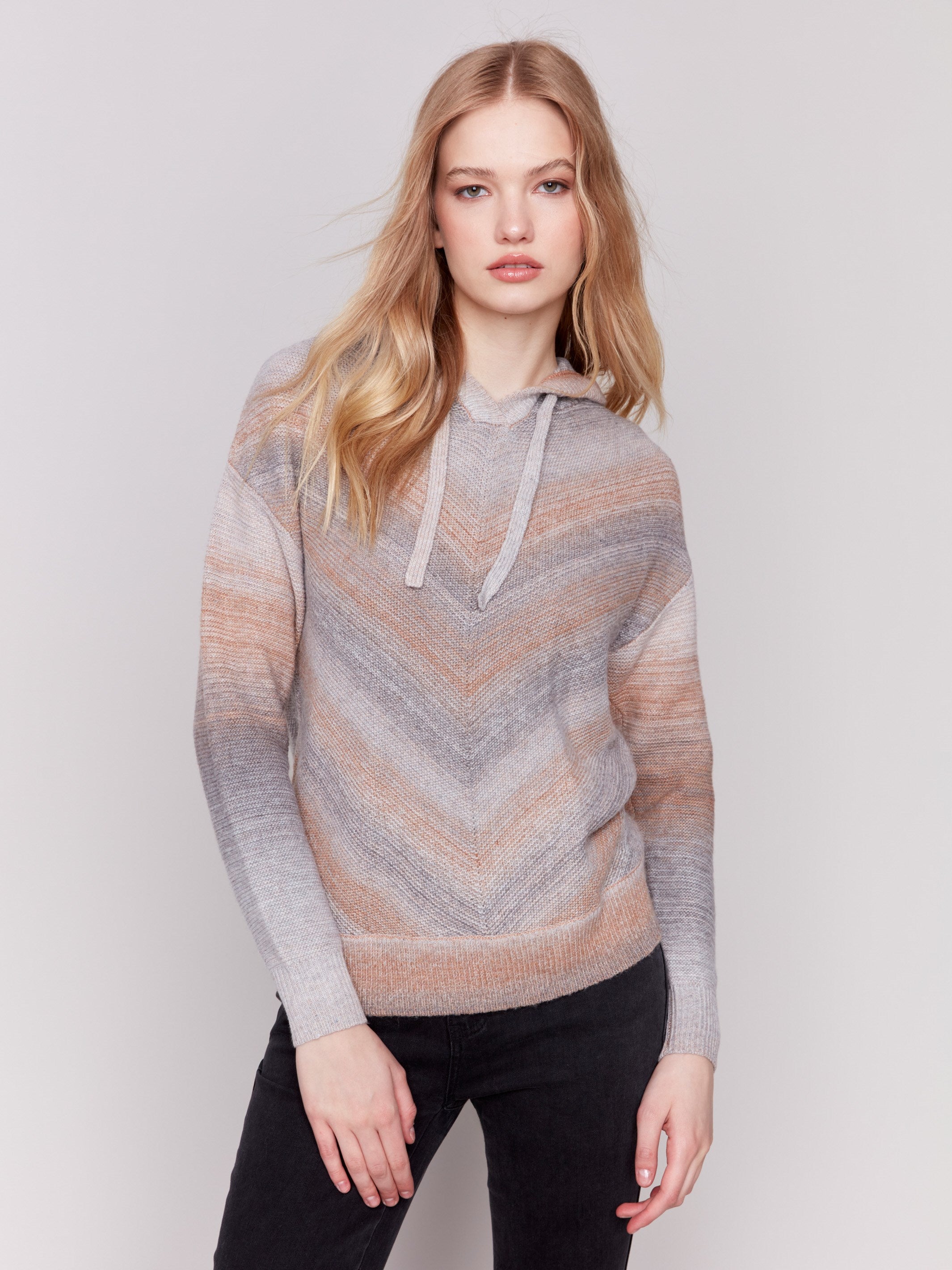 Grey and peach space dye sweater with a hood and long sleeves by Charlie B.