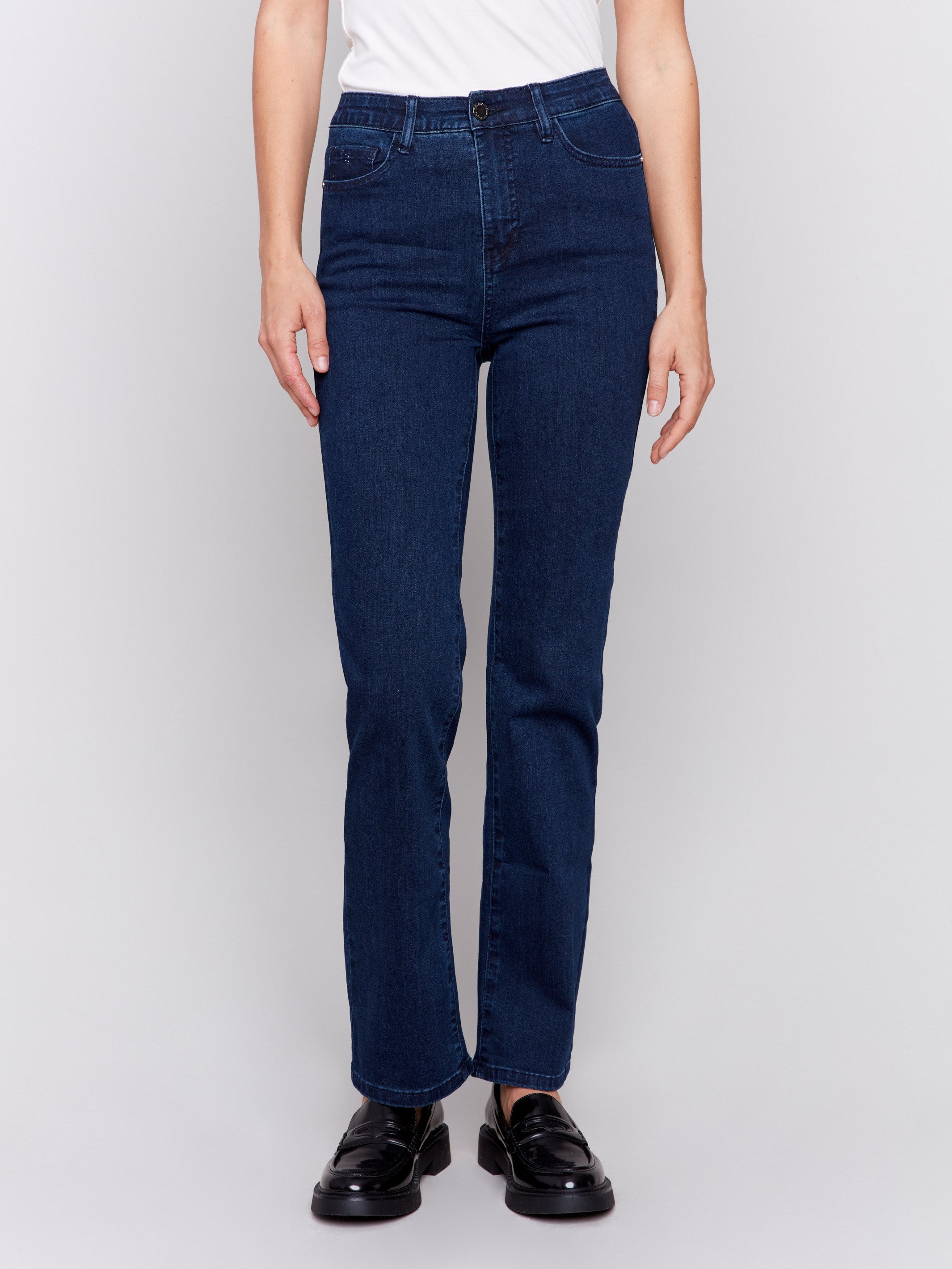 Classic dark blue denim jeans with a straight-leg design, mid-rise, and elastic waistband for women by Charlie B.