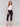 Black capri pants with a slim leg silhouette and stretch fabric by Charlie B.