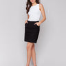 Black skort featuring a slim fit design by Charlie B.