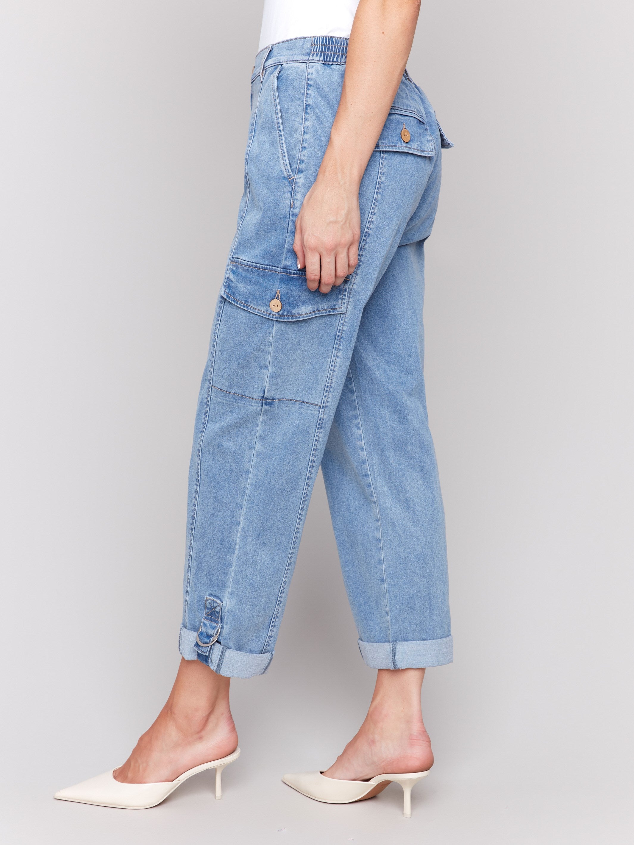 Charlie B chambray pants with regular rise and adjustable hem.