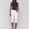 White pedal pusher pants with a cropped length and stretch twill fabric by Charlie B.