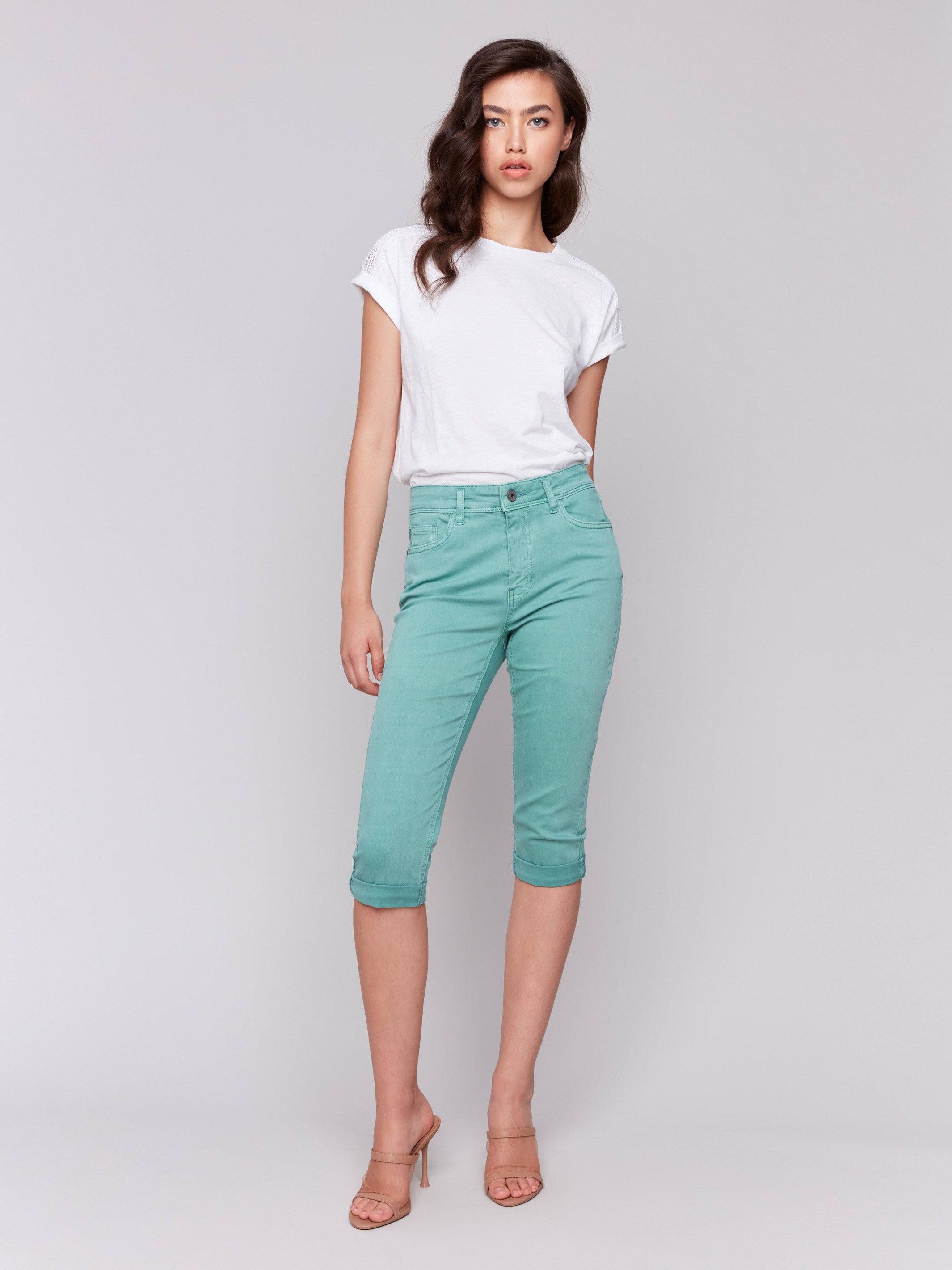 Green pedal pusher pants in stretch twill fabric for a sleek look, by Charlie B.