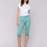 Green pedal pusher pants in stretch twill fabric for a sleek look, by Charlie B.