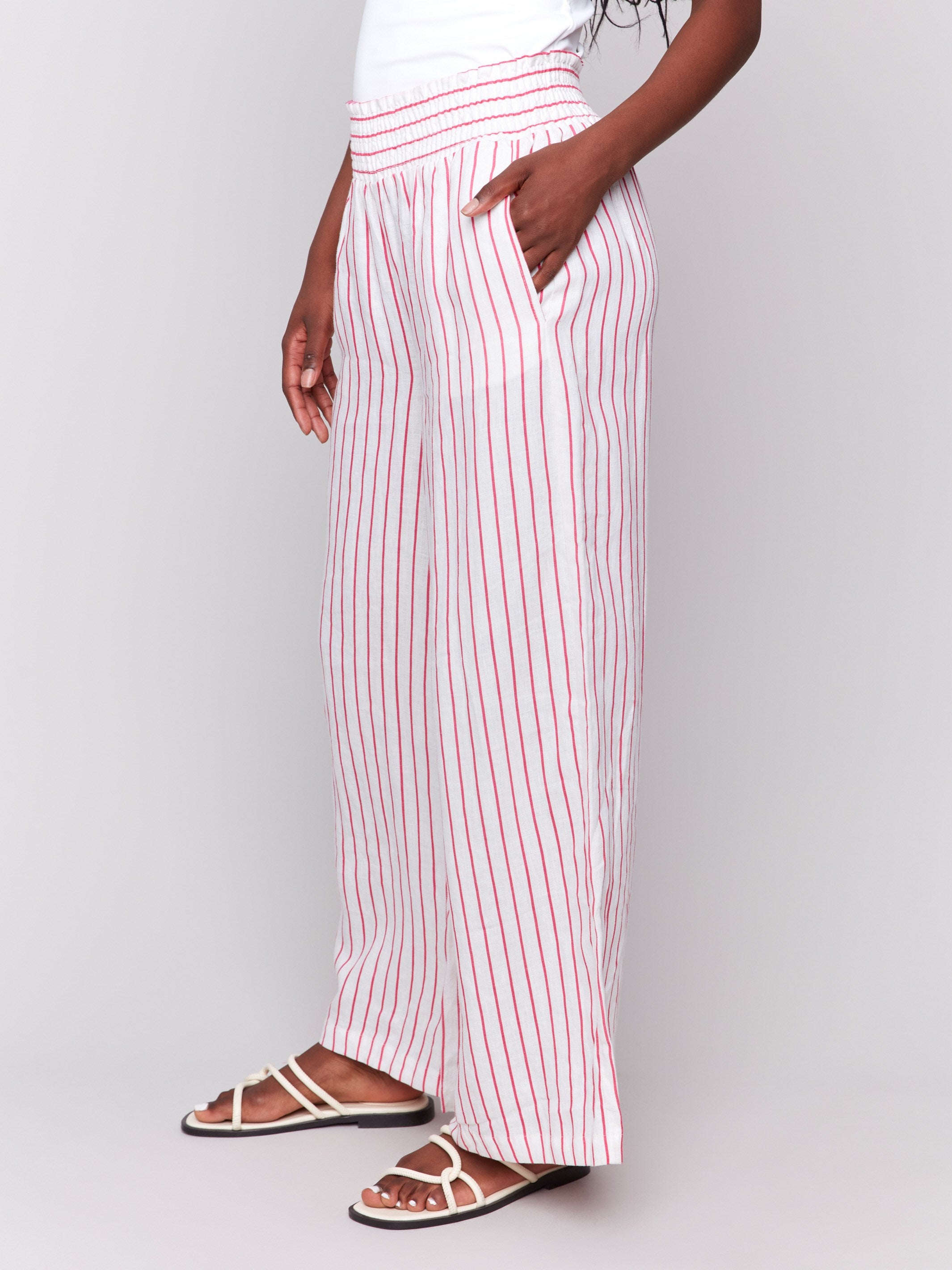 Regular rise pants in light fabric with pink accents by Charlie B.