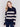 Navy and beige striped turtleneck sweater with a zipper detail and ribbed trim by Charlie B.