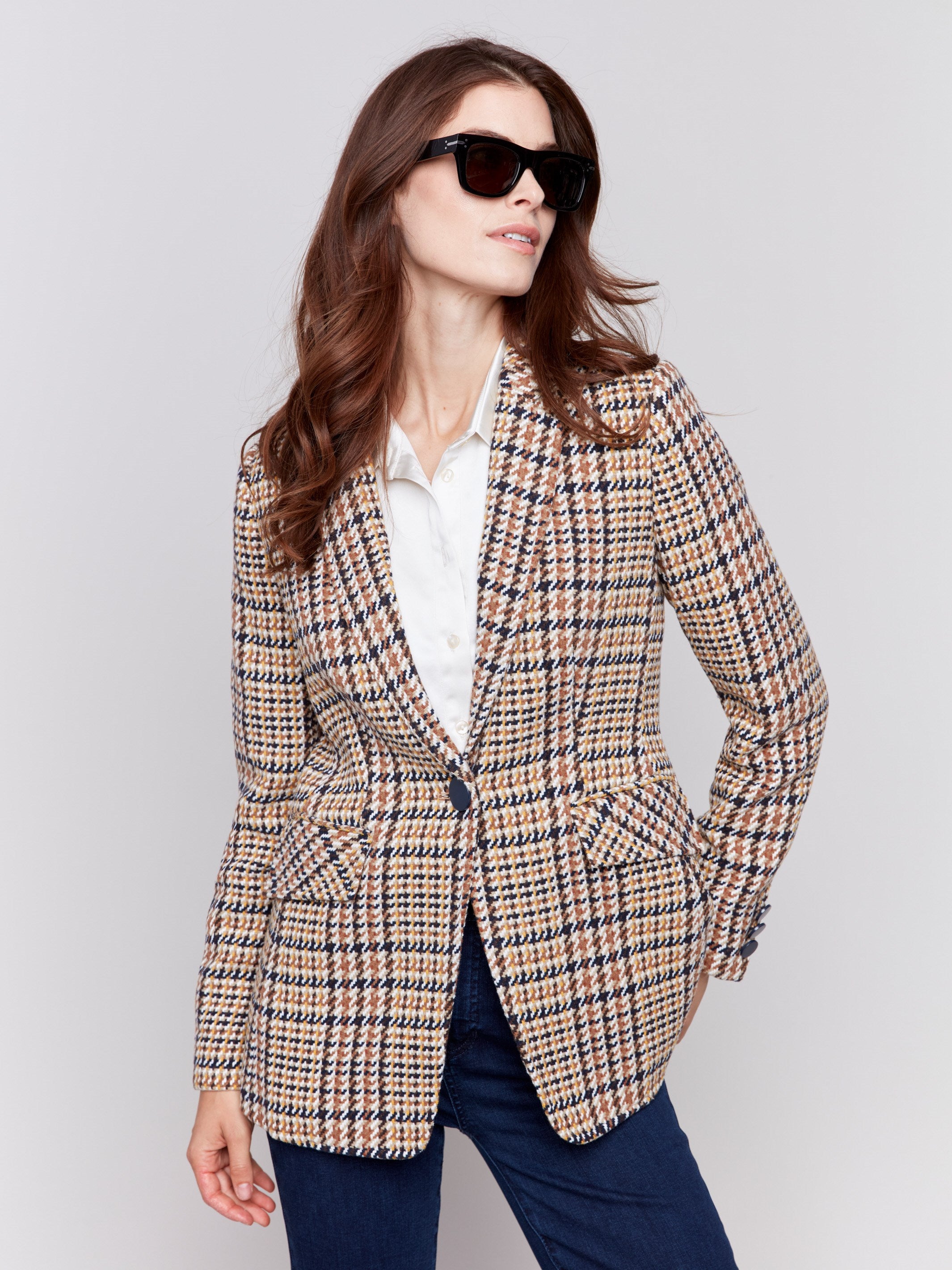 Terracotta plaid blazer with a single-button closure, featuring two front flap pockets by Charlie B.