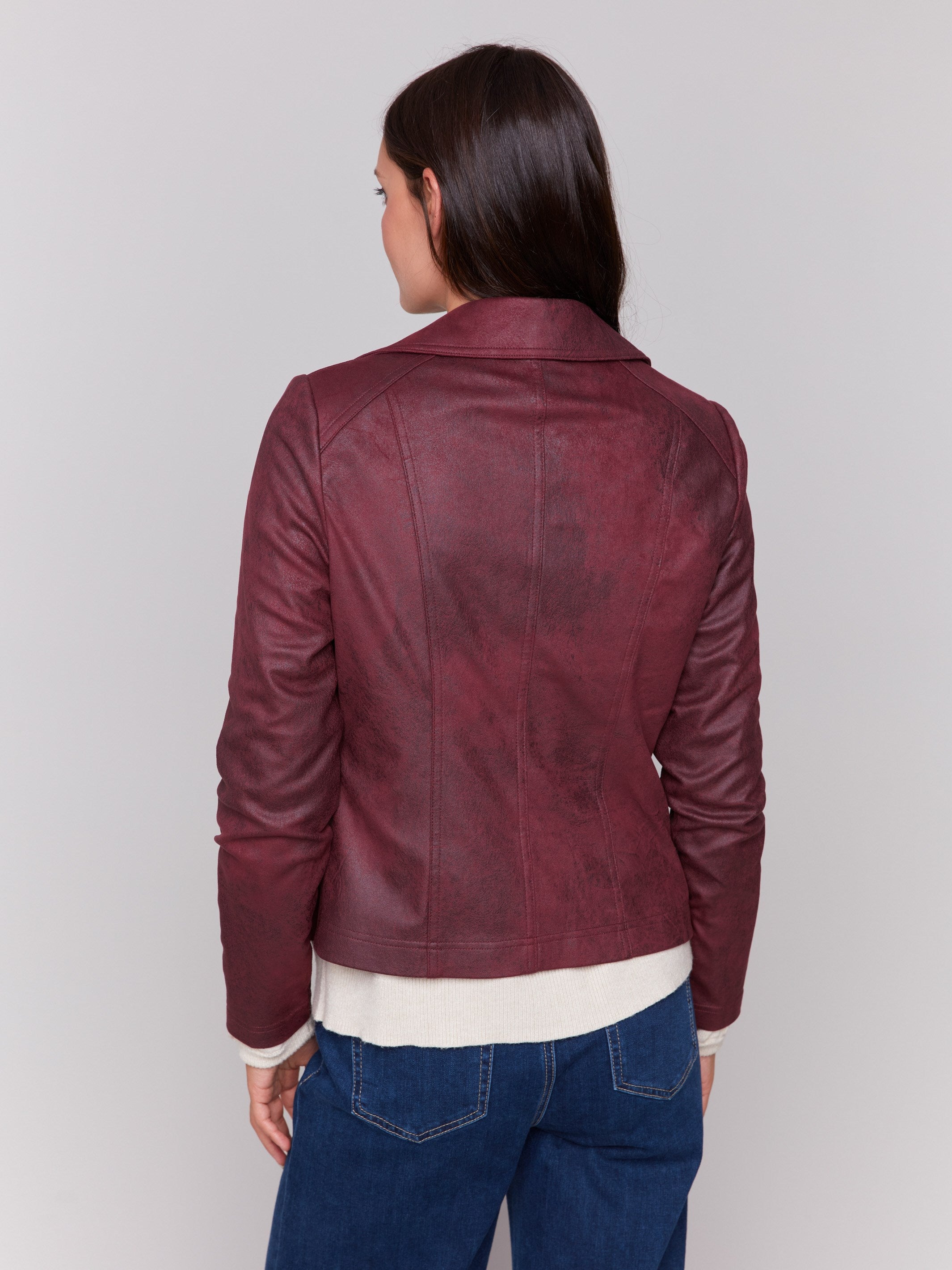 Cabernet red faux leather biker jacket with zipper details and fake pockets by Charlie B.