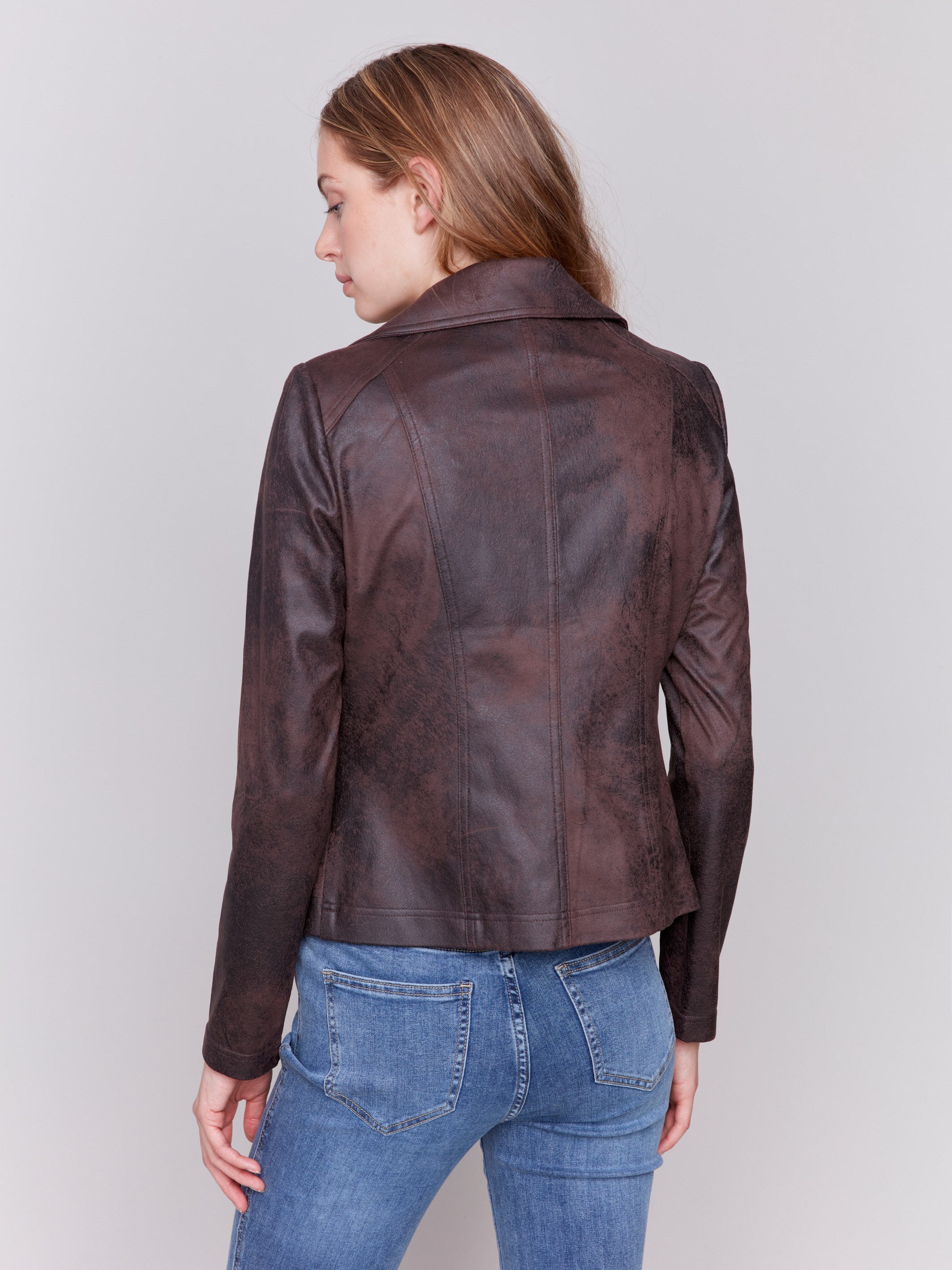 Mocha-colored faux leather biker jacket with zipper details and fake pockets by Charlie B.