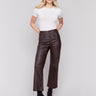 Brown wax flared pants with a flare leg cut, featuring welt front pockets and a regular rise by Charlie B.